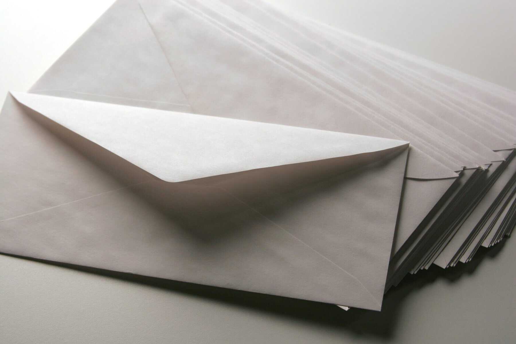 Several,Paper,Envelopers,On,A,Plain,Background